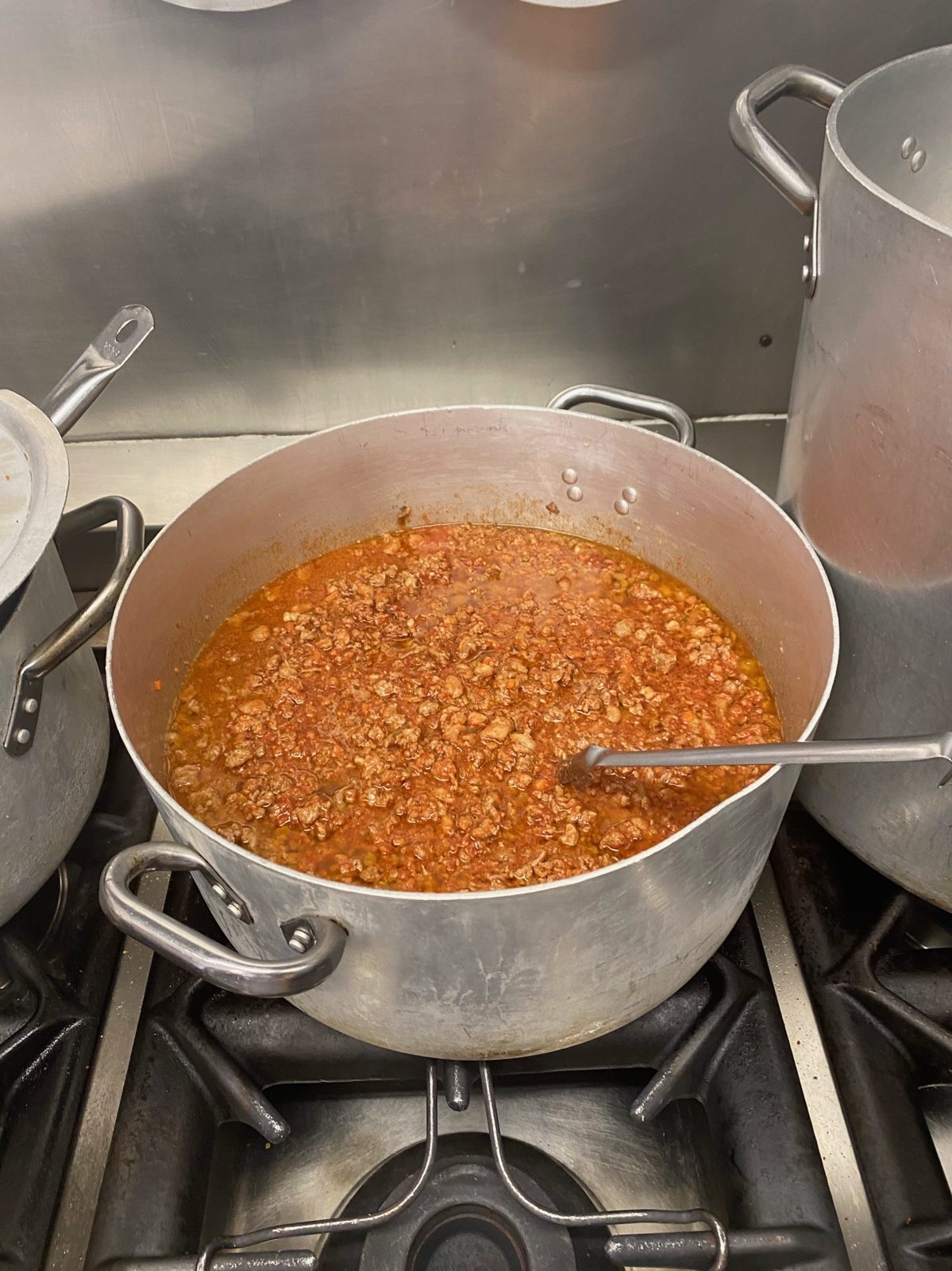 A big pot of ragù simmering away